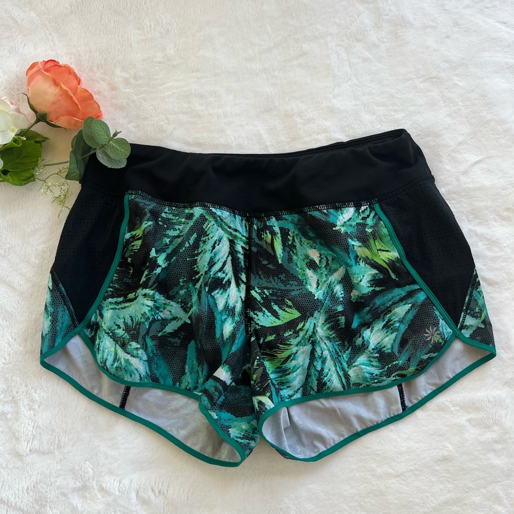 Athleta Women's Running Shorts Green Black Tropical Sz small Back Zipper Liner